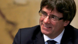 Отстраненный от власти глава Каталонии уехал в Брюссель
